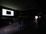 Crna slika, 2012., ambijentalna video instalacija; crno platno (300 x400 cm) na bijelom platnu (500 x 1200 cm), video projekcija